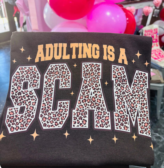 Adulting Is A Scam Tee